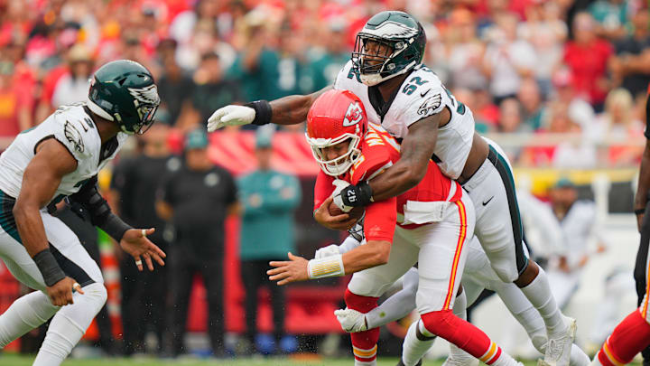 Sep 14, 2025; Kansas City, Missouri, USA; Philadelphia Eagles defensive end Za'Darius Smith (52) sacks Kansas City Chiefs quarterback Patrick Mahomes (15) during the second quarter of the game at GEHA Field at Arrowhead Stadium. Mandatory Credit: Jay Biggerstaff-Imagn Images