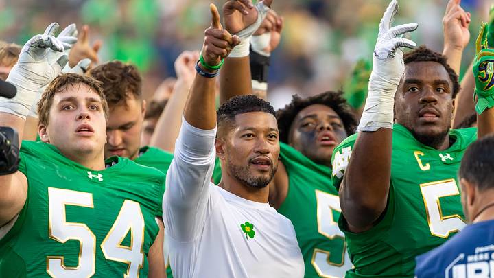 Oct 4, 2025; South Bend, Indiana, USA; Notre Dame Fighting Irish head coach Marcus Freeman sings the Alma Mater after beating the Boise State Broncos at Notre Dame Stadium. Oct 4, 2025; South Bend, Indiana, USA; Notre Dame Fighting Irish head coach Marcus Freeman sings the Alma Mater after beating the Boise State Broncos at Notre Dame Stadium.