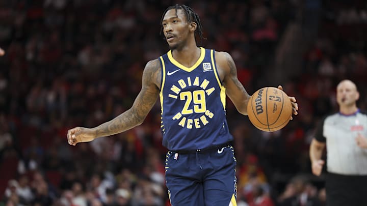 Nov 20, 2024; Houston, Texas, USA; Indiana Pacers guard Quenton Jackson (29) dribbles the ball during the third quarter against the Houston Rockets at Toyota Center. Mandatory Credit: Troy Taormina-Imagn Images