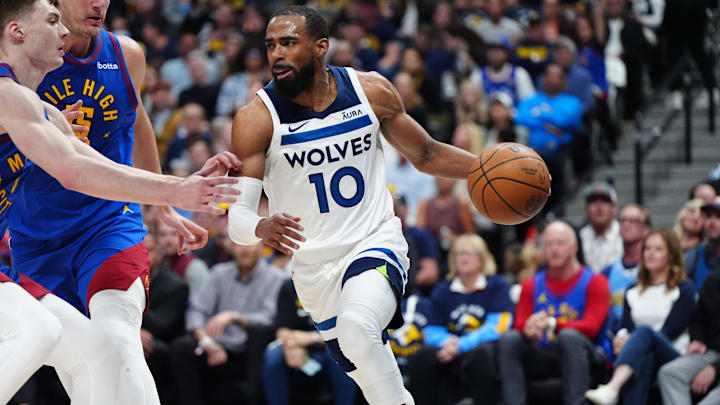 May 4, 2024; Denver, Colorado, USA; Minnesota Timberwolves guard Mike Conley (10) controls the ball