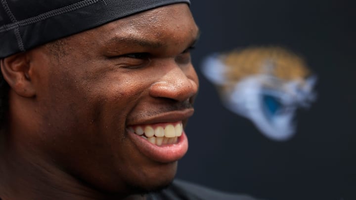 Jacksonville Jaguars wide receiver Travis Hunter (12) talks to members of the media during a rookie minicamp at Miller Electric Center Saturday, May 10, 2025 in Jacksonville, Fla. [Corey Perrine/Florida Times-Union]