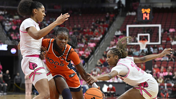 Virginia Cavaliers forward Tabitha Amanze, Louisville Cardinals forward Anaya Hardy and guard Skylar Jones Virginia Cavaliers forward Tabitha Amanze, Louisville Cardinals forward Anaya Hardy and guard Skylar Jones