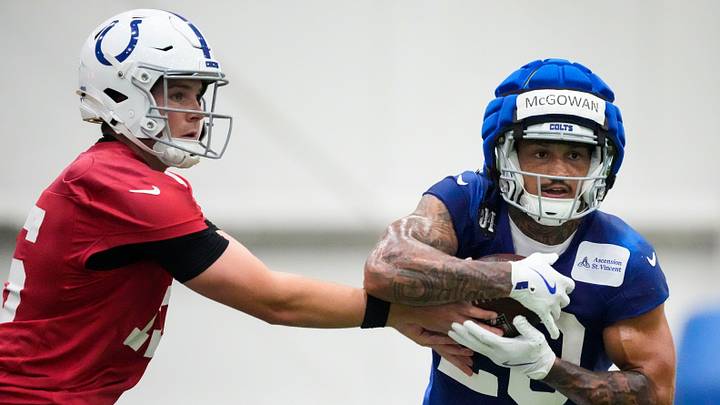 Indianapolis Colts quarterback Riley Leonard (15) hands off the ball to Indianapolis Colts running back Seth McGowan (20) on Wednesday, May 27, 2026, during practice at the Indiana Farm Bureau Football Center in Indianapolis. Indianapolis Colts quarterback Riley Leonard (15) hands off the ball to Indianapolis Colts running back Seth McGowan (20) on Wednesday, May 27, 2026, during practice at the Indiana Farm Bureau Football Center in Indianapolis.