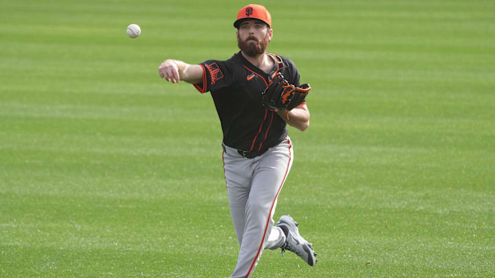 Feb 13, 2025; Scottsdale, AZ, USA; San Francisco Giants pitcher Ryan Walker (74) warms up during spring training camp. Mandatory Credit: Rick Scuteri-Imagn Images Feb 13, 2025; Scottsdale, AZ, USA; San Francisco Giants pitcher Ryan Walker (74) warms up during spring training camp. Mandatory Credit: Rick Scuteri-Imagn Images