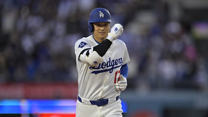 Los Angeles, California, USA; Los Angeles Dodgers designated hitter Shohei Ohtani (17) celebrates after hitting a solo home run in the first inning against the Colorado Rockies at Dodger Stadium.