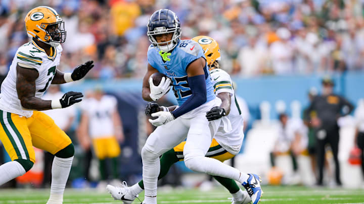 Sep 22, 2024; Nashville, Tennessee, USA;  Tennessee Titans wide receiver Tyler Boyd (83) makes a catch against the Green Bay Packers during the first half at Nissan Stadium.
