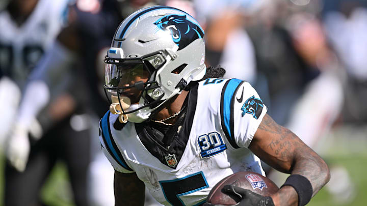 Oct 6, 2024; Chicago, Illinois, USA; Carolina Panthers wide receiver Diontae Johnson (5) runs after a catch against the Chicago Bears during the third quarter at Soldier Field. Mandatory Credit: Daniel Bartel-Imagn Images