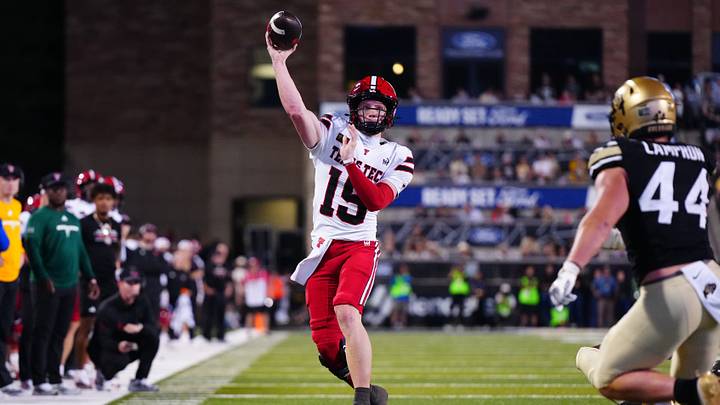 Oct 3, 2026; Boulder, Colorado, USA;  Texas Tech Red Raiders quarterback Will Hammond (15) attempts a two-point conversion in the third quarter against the Colorado Buffaloes at Folsom Field.  Mandatory Credit: Ron Chenoy-Imagn Images