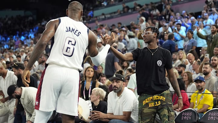 LeBron James (6) shakes hands with son Bryce James during the Paris 2024 Olympic Summer Games.