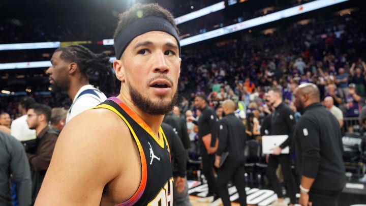 Apr 28, 2024; Phoenix, Arizona, USA; Phoenix Suns guard Devin Booker (1) leaves the court after game four of the first round for the 2024 NBA playoffs against the Minnesota Timberwolves at Footprint Center. Mandatory Credit: Joe Camporeale-USA TODAY Sports Apr 28, 2024; Phoenix, Arizona, USA; Phoenix Suns guard Devin Booker (1) leaves the court after game four of the first round for the 2024 NBA playoffs against the Minnesota Timberwolves at Footprint Center. Mandatory Credit: Joe Camporeale-USA TODAY Sports
