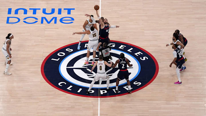 May 1, 2025; Inglewood, California, USA; A general overall view of the opening tipoff between Denver Nuggets center Nikola Jokic (15) and LA Clippers center Ivica Zubac (40) during game six of first round for the 2025 NBA Playoffs at Intuit Dome. Mandatory Credit: Kirby Lee-Imagn Images