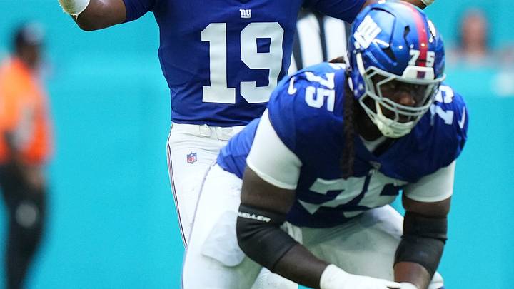Aug 22, 2026; Miami Gardens, Florida, USA; New York Giants OL Joshua Ezeudu prepares for a play against the Miami Dolphins. Aug 22, 2026; Miami Gardens, Florida, USA; New York Giants OL Joshua Ezeudu prepares for a play against the Miami Dolphins.