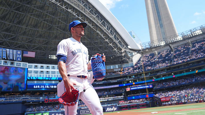 Jose BerrĂos of Toronto Blue Jays walks on field Jose BerrĂos of Toronto Blue Jays walks on field