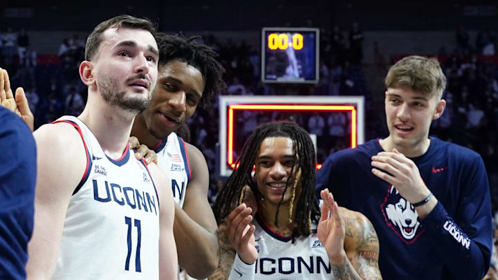 UConn Huskies forward Alex Karaban talks to the crowd.