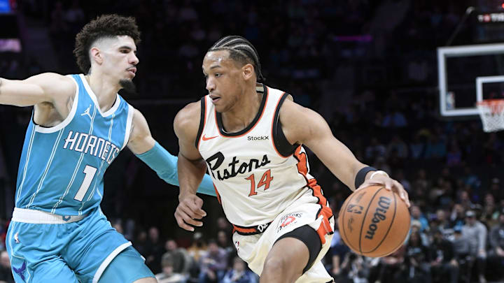 Nov 21, 2024; Charlotte, North Carolina, USA: Detroit Pistons guard Wendell Moore Jr. (14) drives past Charlotte Hornets guard LaMelo Ball (1) during the first half at the Spectrum Center. Mandatory Credit: Sam Sharpe-Imagn Images Nov 21, 2024; Charlotte, North Carolina, USA: Detroit Pistons guard Wendell Moore Jr. (14) drives past Charlotte Hornets guard LaMelo Ball (1) during the first half at the Spectrum Center. Mandatory Credit: Sam Sharpe-Imagn Images