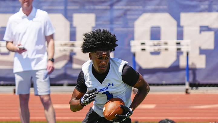 Chandler wide receiver Jai Jones (1) catches a passes and runs in a drill during spring football showcase at Chandler High School in Chandler on May 12, 2026. Chandler wide receiver Jai Jones (1) catches a passes and runs in a drill during spring football showcase at Chandler High School in Chandler on May 12, 2026.