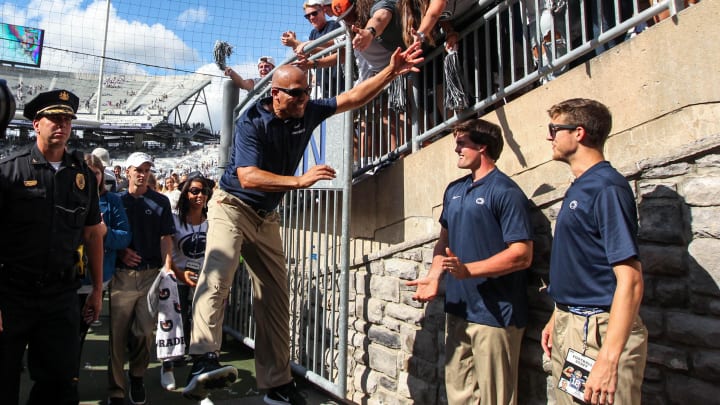 Penn State football coach James Franklin celebrates with the students after a Nittany Lions win at Beaver Stadium.