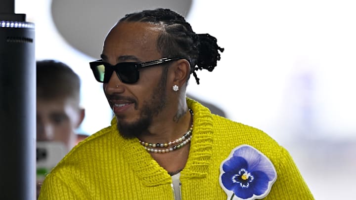 Oct 20, 2024; Austin, Texas, USA; Mercedes AMG Petronas F1 Team driver Lewis Hamilton (44) of Team Great Britain walks through the track entrance before the 2024 Formula One US Grand Prix at Circuit of the Americas. Mandatory Credit: Jerome Miron-Imagn Images