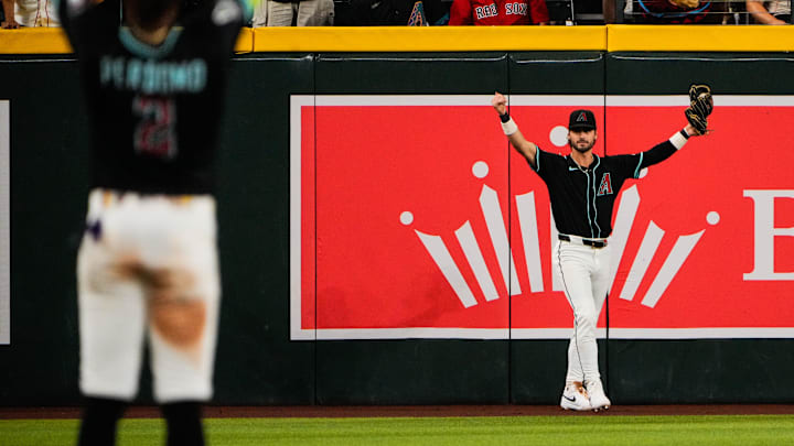 Sep 6, 2025; Phoenix, Arizona, USA; Arizona Diamondbacks shortstop Blaze Alexander (9) celebrates robbing a home run during the eighth inning against the Arizona Diamondbacks at Chase Field. Mandatory Credit: Arianna Grainey-Imagn Images Sep 6, 2025; Phoenix, Arizona, USA; Arizona Diamondbacks shortstop Blaze Alexander (9) celebrates robbing a home run during the eighth inning against the Arizona Diamondbacks at Chase Field. Mandatory Credit: Arianna Grainey-Imagn Images