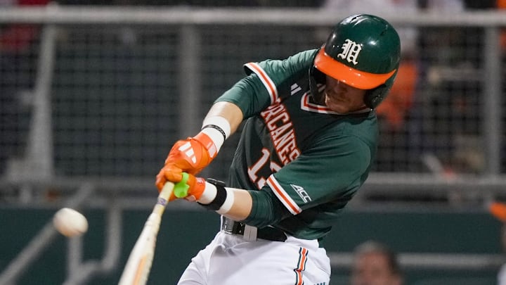Miami Catcher Alex Sosa hitting a homerun against Boston College Miami Catcher Alex Sosa hitting a homerun against Boston College