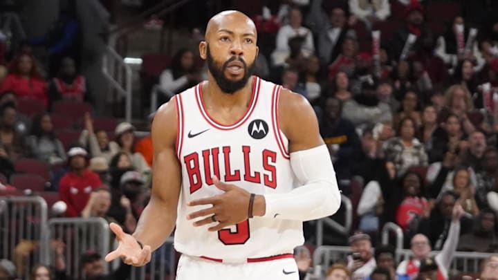Oct 16, 2025; Chicago, Illinois, USA; Chicago Bulls guard Jevon Carter (5) makes a three point basket over against the Minnesota Timberwolves during the second half at United Center. Mandatory Credit: David Banks-Imagn Images
