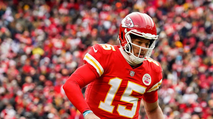 Dec 24, 2022; Kansas City, Missouri, USA; Kansas City Chiefs quarterback Patrick Mahomes (15) runs for a touchdown during the second half against the Seattle Seahawks at GEHA Field at Arrowhead Stadium. Mandatory Credit: Jay Biggerstaff-Imagn Images