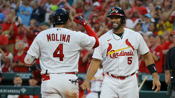 Pujols celebró con su compañero Yadier Molina