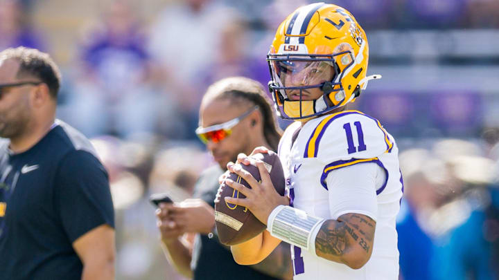 Nov 15, 2025; Baton Rouge, Louisiana, USA;  LSU Tigers quarterback Michael van Buren Jr. (11) passes the ball during warm ups before the game against the Arkansas Razorbacks at Tiger Stadium. Mandatory Credit: Stephen Lew-Imagn Images
