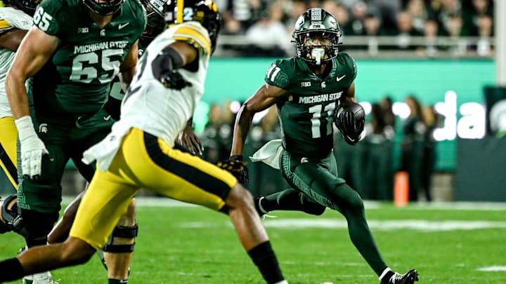 Michigan State's Aziah Johnson runs for a gain against Iowa in the second quarter on Saturday, Oct. 19, 2024, at Spartan Stadium in East Lansing.