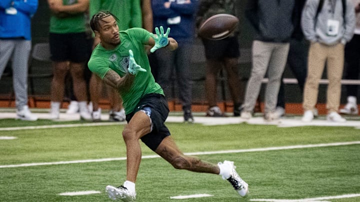Oregon wide receiver Tez Johnson catches a pass during the Oregon football’s Pro Day Tuesday, March 18, 2025, at the Moshofsky Center in Eugene, Ore.