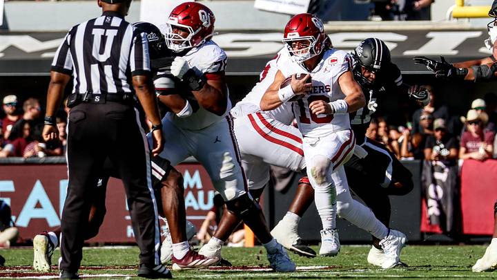 Oklahoma quarterback John Mateer rushes in the first half against Mississippi State. Oklahoma quarterback John Mateer rushes in the first half against Mississippi State.