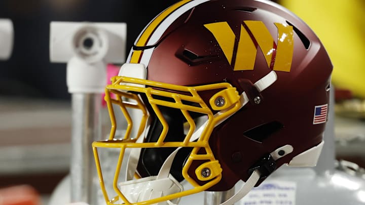 Nov 2, 2025; Landover, Maryland, USA; A Washington Commanders player's helmet on the bench during the game against the Seattle Seahawks at Northwest Stadium. Mandatory Credit: Geoff Burke-Imagn Images