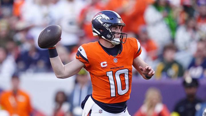 Dec 14, 2025; Denver, Colorado, USA; Denver Broncos quarterback Bo Nix (10) throws downfield during the second quarter against the Green Bay Packers at Empower Field at Mile High. 