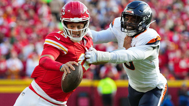 Nov 10, 2024; Kansas City, Missouri, USA; Kansas City Chiefs quarterback Patrick Mahomes (15) runs the ball against Denver Broncos linebacker Jonathon Cooper (0) during the second half at GEHA Field at Arrowhead Stadium. Nov 10, 2024; Kansas City, Missouri, USA; Kansas City Chiefs quarterback Patrick Mahomes (15) runs the ball against Denver Broncos linebacker Jonathon Cooper (0) during the second half at GEHA Field at Arrowhead Stadium.