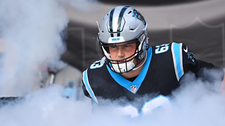 Nov 27, 2022; Charlotte, North Carolina, USA;  Carolina Panthers guard Austin Corbett (63) runs on to the field at Bank of America Stadium. 
