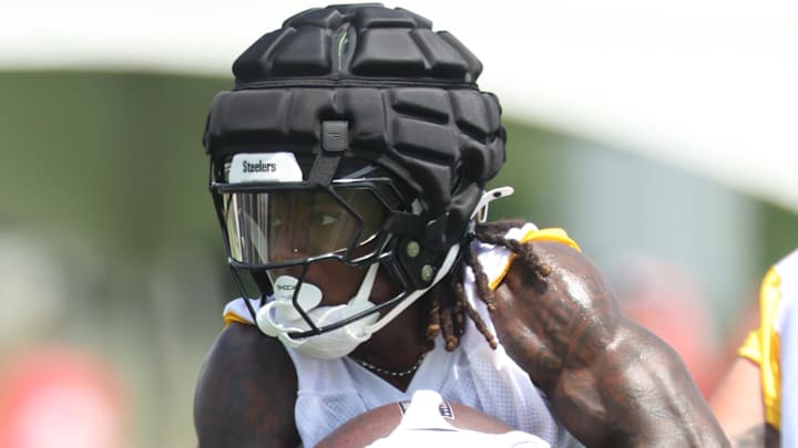 Jul 24, 2025; Latrobe, PA, USA;  Pittsburgh Steelers running back Kaleb Johnson (20) participates in drills during training camp at Saint Vincent College. Mandatory Credit: Charles LeClaire-Imagn Images