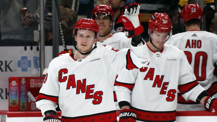 Former Carolina Hurricanes winger Jake Guentzel waves to the crowd. Former Carolina Hurricanes winger Jake Guentzel waves to the crowd.