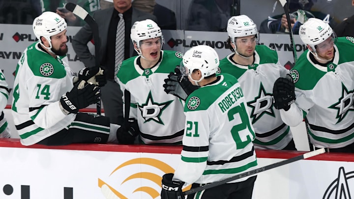 Dec 9, 2025; Winnipeg, Manitoba, CAN; Dallas Stars left wing Jason Robertson (21) celebrates his goal against the Winnipeg Jets in the third period at Canada Life Centre. Mandatory Credit: James Carey Lauder-Imagn Images