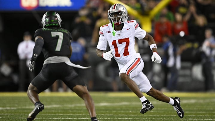 Oct 12, 2024; Eugene, Oregon, USA; Ohio State Buckeyes wide receiver Carnell Tate (17) runs a pass route during the second half against Oregon Ducks defensive back Jabbar Muhammad (7) at Autzen Stadium.