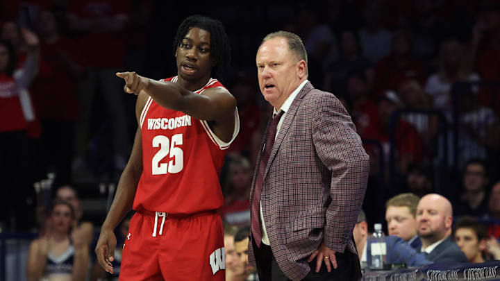 Dec 9, 2023; Tucson, Arizona, USA; Wisconsin Badgers guard John Blackwell (25) talks to Wisconsin Badgers head coach Greg Gard during the second half at McKale Center.