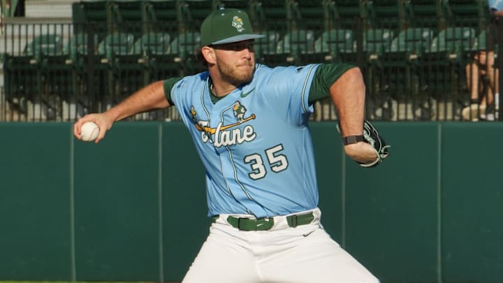 Tulane baseball pitcher throws the ball during a game. 