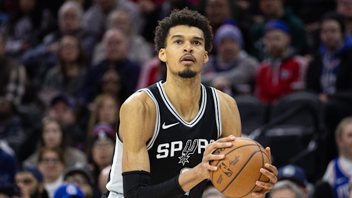 Dec 23, 2024; Philadelphia, Pennsylvania, USA; San Antonio Spurs center Victor Wembanyama (1) shoots the ball against the Philadelphia 76ers during the fourth quarter at Wells Fargo Center. Mandatory Credit: Bill Streicher-Imagn Images Dec 23, 2024; Philadelphia, Pennsylvania, USA; San Antonio Spurs center Victor Wembanyama (1) shoots the ball against the Philadelphia 76ers during the fourth quarter at Wells Fargo Center. Mandatory Credit: Bill Streicher-Imagn Images