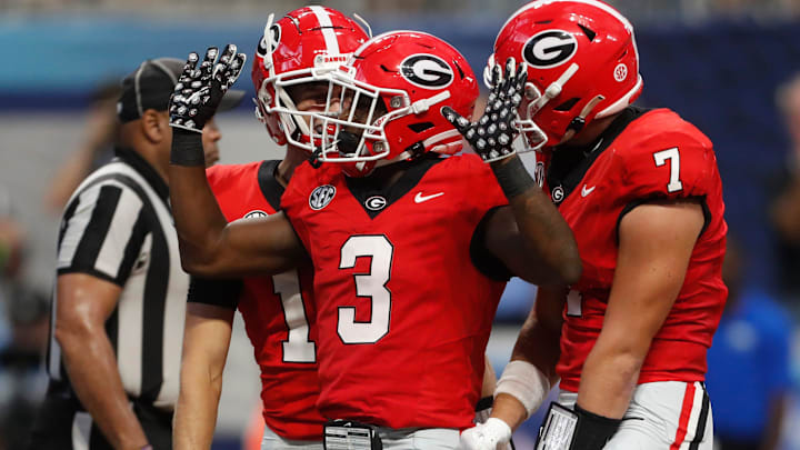 Georgia running back Nate Frazier (3) celebrates after scoring a touchdown during the second half of the NCAA Aflac Kickoff Game against Clemson in Atlanta, on Saturday, Aug. 31, 2024.