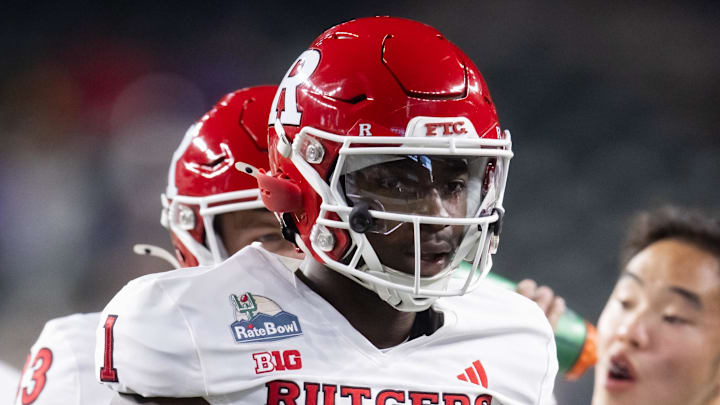Dec 26, 2024; Phoenix, AZ, USA; Rutgers Scarlet Knights linebacker Mohamed Toure (1) against the Kansas State Wildcats during the Rate Bowl at Chase Field. Mandatory Credit: Mark J. Rebilas-Imagn Images