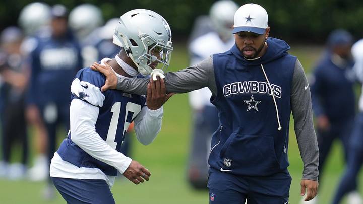 Dallas Cowboys defensive back Caleb Downs and defensive coordinator Christian Parker.