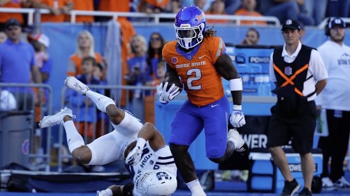Oct 5, 2024; Boise, Idaho, USA; Boise State Broncos running back Ashton Jeanty (2) runs for a 63 yard touchdown during the first quarter against the Utah State Aggies at Albertsons Stadium. Mandatory Credit: Brian Losness-Imagn Images

