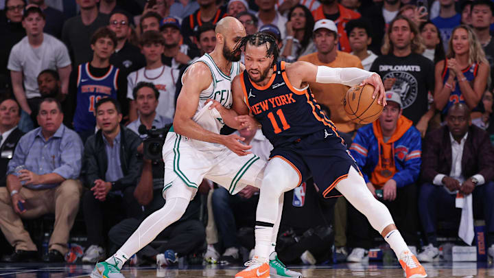 May 12, 2025; New York, New York, USA; New York Knicks guard Jalen Brunson (11) dribbles as Boston Celtics guard Derrick White (9) defends in the second half during game four of the second round for the 2025 NBA Playoffs at Madison Square Garden. Mandatory Credit: Vincent Carchietta-Imagn Images
