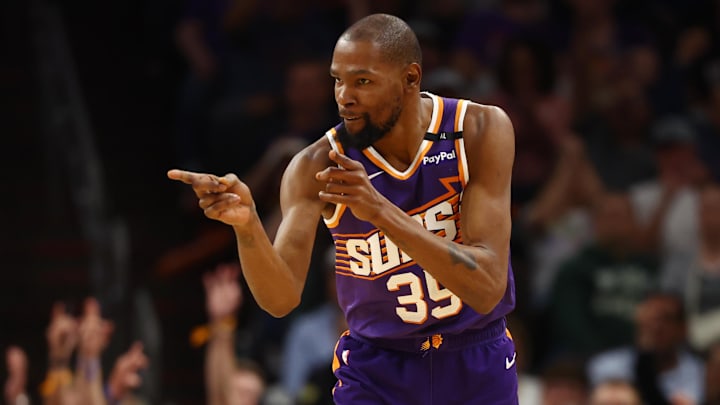 Mar 24, 2025; Phoenix, Arizona, USA; Phoenix Suns forward Kevin Durant (35) reacts against the Milwaukee Bucks at Footprint Center. Mandatory Credit: Mark J. Rebilas-Imagn Images