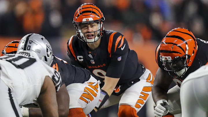Jan 15, 2022; Cincinnati, Ohio, USA; Cincinnati Bengals quarterback Joe Burrow (9) calls a play against the Las Vegas Raiders in the second half in an AFC Wild Card playoff football game at Paul Brown Stadium. Mandatory Credit: Katie Stratman-Imagn Images Jan 15, 2022; Cincinnati, Ohio, USA; Cincinnati Bengals quarterback Joe Burrow (9) calls a play against the Las Vegas Raiders in the second half in an AFC Wild Card playoff football game at Paul Brown Stadium. Mandatory Credit: Katie Stratman-Imagn Images