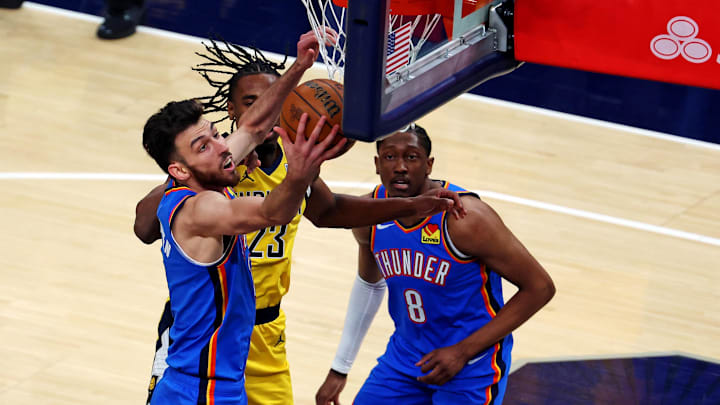 Jun 11, 2025; Indianapolis, Indiana, USA; Oklahoma City Thunder forward Chet Holmgren (7) shoots the ball against Indiana Pacers forward Aaron Nesmith (23) during the first quarter in game three of the 2025 NBA Finals at Gainbridge Fieldhouse. Mandatory Credit: Trevor Ruszkowski-Imagn Images